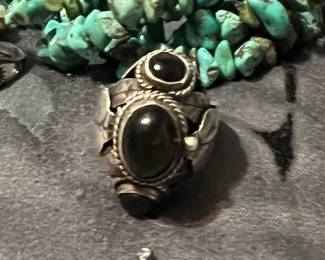 This is a poison ring that opens to reveal a secret compartment!