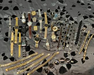 Tons of watches and some really nice men’s stainless steel and 14K Gp bracelets!