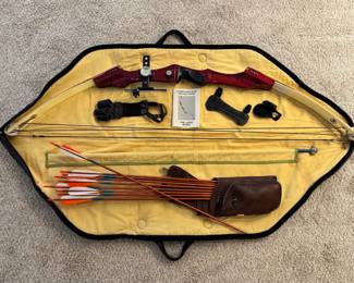 c.a. 1970’s/80’s PSE Precision Laser Compound Bow with aluminum archery stabilizer, arrows w/ case, accessories and case