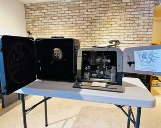 Complete vintage Bell & Howell Filmosound film reel & speaker 