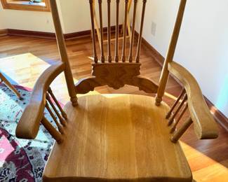 Large 72” diameter oak wood pedestal dining table.  The top to this table is one solid piece and comes with full table pads, four side chairs and two captains chairs