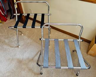 One new (black straps) and one vintage (gray straps) folding chrome luggage racks