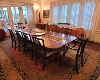 12 ft adjustable classic mahogany pedestal table. 10 Chippendale mahogany chairs