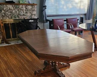Antique Dining Table - Has two extra leaves installed. 
