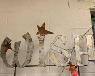 Beautiful metal sculpture “Wish” with stars