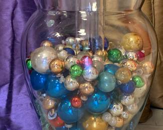 Art glass double vase filled w vintage Christmas ornaments