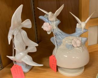 Lots of bird figurines and music boxes