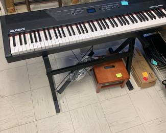 Alesis electric keyboard w all parts and stand, working