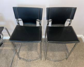 Faux leather stools.
