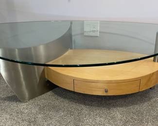 Unique high-end contemporary coffee table and end table.