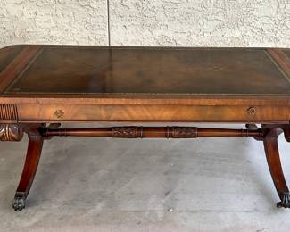 Leather Top Coffee Table, Mahogany with folding end flaps.