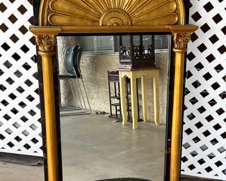 Gilt wall mirror with shelf