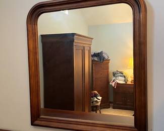 Wood framed wall mirror