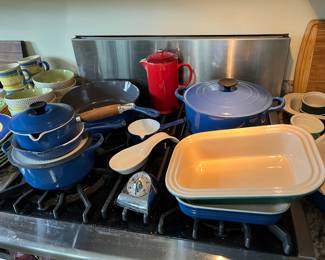 Le Creuset dutch oven, pots, pans and stoneware dishes.....