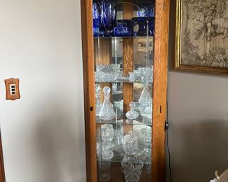 Lighted corner curio cabinet