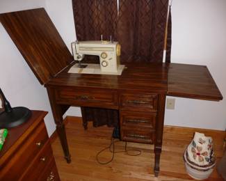 Kenmore sewing machine with cabinet