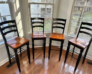 R14 - $100. Set of 4 Wooden Bar Stools. Measures 16" wide x 16" deep x 30" floor to seat. Floor to back is 46" tall. Stained Black & Wooden Seats - all show little bits of wear (scuffs, marks etc.) but all are sturdy!