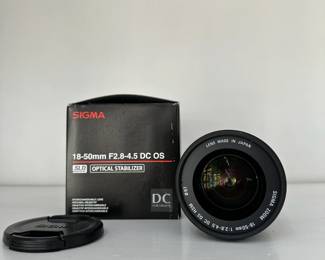 R7 - $100. Sigma 18-50mm f2.8-4.5 DC OS