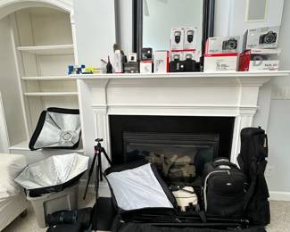 Great Camera and Camera equipment sale for Portraiture, Wedding, and Landscape Photography. Multiple Camera Bodys, Lenses, Batteries, Traveling Cases, and Studio/ Backdrop Equipment.