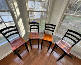 R14 - $100. Set of 4 Wooden Bar Stools. Measures 16" wide x 16" deep x 30" floor to seat. Floor to back is 46" tall. Stained Black & Wooden Seats - all show little bits of wear (scuffs, marks etc.) but all are sturdy!
