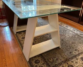 R42 - $50. IKEA Desk. Measures 59" x 32" x 28" tall. Moves in 3 easy pieces (glass & 2 saw horses)