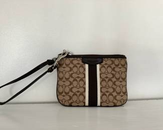 R33 - $12. Coach Wristlet. 