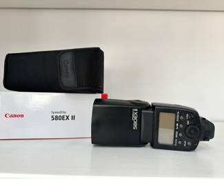 R4 - $50.  Canon 580EX II Speedlight w/ Stand & Box - 1 available (2 Claimed)