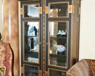One of Two Hand Carved Hand Painted Black Lacquer Lit Display Cabinets