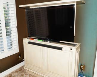 Custom cabinet with hidden TV