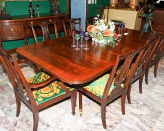 Henkel-Harris Flame Mahogany dining table with 10 Versace chairs x 2.  These are stunning!