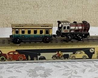 VINTAGE ARNOLD TIN WIND UP RAIL ROAD TRAIN