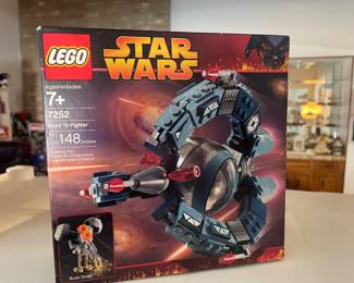 few collectible star wars legos set   i believe never opened for most 