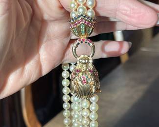 Item 16 - Pearl Necklace
One pearl necklace with 14k yellow gold clasp containing emeralds, rubies and
sapphires, with the following characteristics:
Akoya Pearl Necklace Attributes
Weight: 132.00 gms
Strand Length: 30 inches - Opera
Number of Strands: 3
Number of pearls: 302
Size: 6 mm to 6-1/2 mm
Shape: Near round
Color: Cream / w/ green overtones
Luster: Very Good
Surface: Lightly spotted
Nacre quality: Very good
Matching: Very good
Clasp: 14K yellow gold with emeralds, rubies and
sapphires
$4560