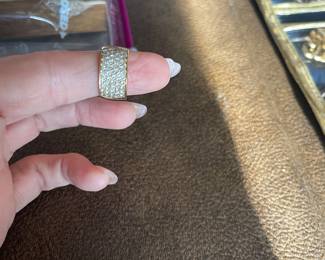 Item 11 - Ring
One diamond wedding band with the following characteristics:
Total Diamond Weight: 1.08 ct
Item Attributes
Weight: 6.00 gms
Metal: 18K yellow gold
Manufacturing: Custom wax and cast
Condition: Good
Finish: Polished
Setting: Pave set
Trademark: Not legible
Natural Diamond Melee Attributes
Shape and cut: Round full cut
Weight: 0.02 ct each
Number of diamonds: 54
Total Weight: 1.08 ct (estimated)
Measurements: 1.9 - 2 mm
Clarity: VS
Color: G-H
Cut: Good
Polish: Good
$1040