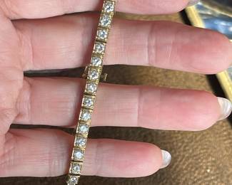 Item 9 - Bracelet
One diamond tennis bracelet with the following characteristics:
Total Diamond Weight: 5.00 ct
Bracelet Attributes
Weight: 19.10 gms
Metal Content: 14K yellow gold
Manufacture: Cast and assembled
Length/Width: 7.0 inches / 4.4 mm
Clasp: Box
Condition: Good
Trademark: None
Natural Diamond Melee Attributes
Shape and cut: Round full cut
Weight: 0.124 to 0.145 ct each
Number of diamonds: 38
Total Weight: 5.00 ct (estimated)
Measurements: 3,1 - 3.4 mm
Clarity: VS-2
Color: G-H
Cut: Good
Polish: Good
Setting: Bead set
$3240