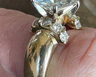 Weight: 6.70 gms
Metal: 14K yellow gold
Manufacturing: Cast and assembled
Condition: Good
Finish: Polished
Setting: Prong, channel set
Trademark: None
Natural Diamond Melee Attributes
Shape and cut: Round full cut
Weight: 0.046 ct each
Number of diamonds: 5
Total Weight: 0.23 ct (actual)
Measurements: 2 mm
Clarity: VS
Color: F-G
Cut: Good
Polish: Good
Setting: Channel set
$39,680