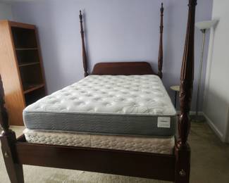 Beautiful 4 poster wood Queen Rice bed with steps and Pristine mattress and box springs.