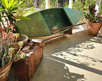 Vintage canoe with pull trailer.