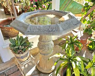 Large concrete birdbath.