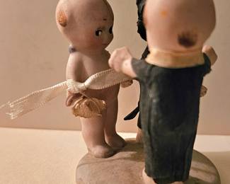 Vintage bisque Kewpie wedding scene.