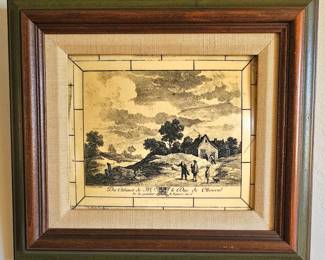 Framed etching.