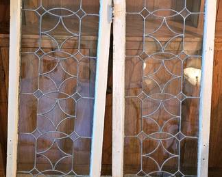 Pair of old leaded glass windows.