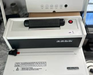 B22 - $120.  Coil (Spiral) Binding Machine Comes with Manual and several size coils.  Looks brand new!