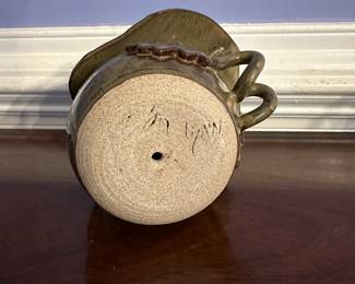 B185 - $25. Signed "Lynn" Pottery Bird House.