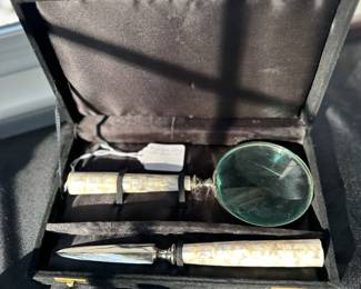 B24 - $60.  Mother of Pearl Desk components.  Magnifying Glass and Letter opener.  Carrying case included. 