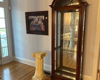B18 - $175.  Pulaski Lighted Curio Cabinet.  Excellent condition.  Measures 31.5" Wide x  13" Deep x 80.25" Tall.  