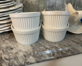 B162 - $12. Set of 4 Sur La Table dishes. 
