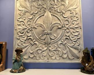 B45 - $20.  Beautiful Metal Wall decor with prominent 3D  Fleur De Lis.  Measures 3' x 3'.