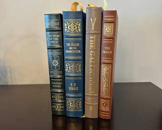 B189 - $40 Each. EASTON PRESS COLLECTOR'S EDITION BOUND IN GENUINE LEATHER. The Beak of the Finch. The Zealot and the Emancipator. The Gallic Wars. The Prince.   (Basket 4) 