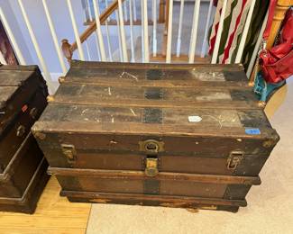B28 - $30. Vintage Steamer Trunk.  Some scratches and chips in finish lots of life left in this storage staple.  Measures 35"Wx20"Dx22"T